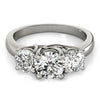 Three-Stone Round Platinum Engagement Ring