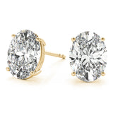Oval 14K Yellow Gold Moissanite Four Prong Studs