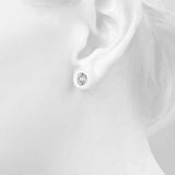 Oval Platinum Four-Prong Stud Earrings