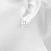 Emerald Platinum Four-Prong Stud Earrings